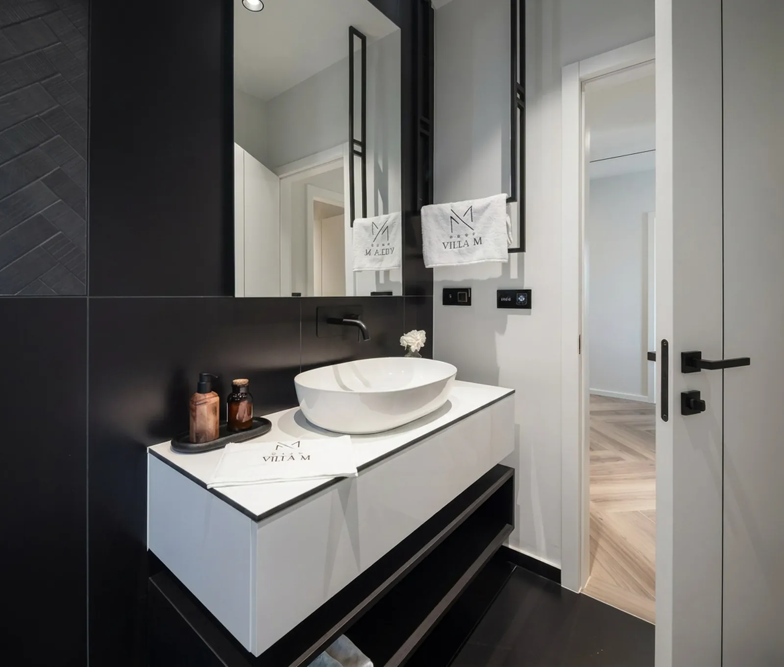 En-suite bathroom with a floating vanity and vessel basin