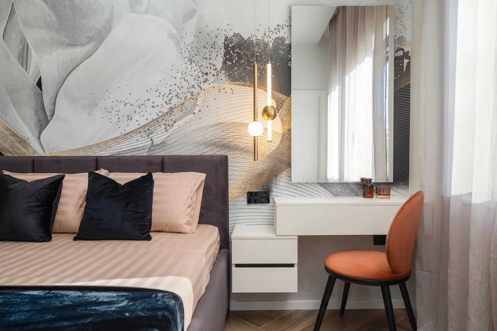 Primary suite with an artistic headboard and reading chair