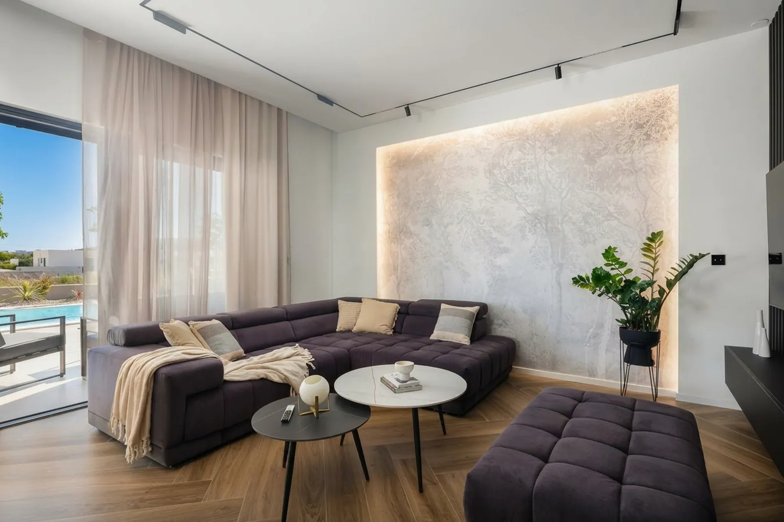 Bright living room with a deep sofa and soft daylight