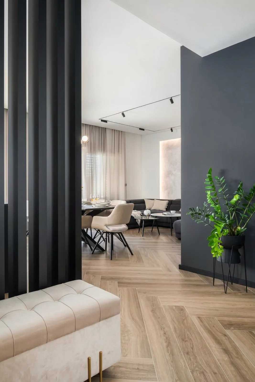 Living room detail with fluted screen and bench seating