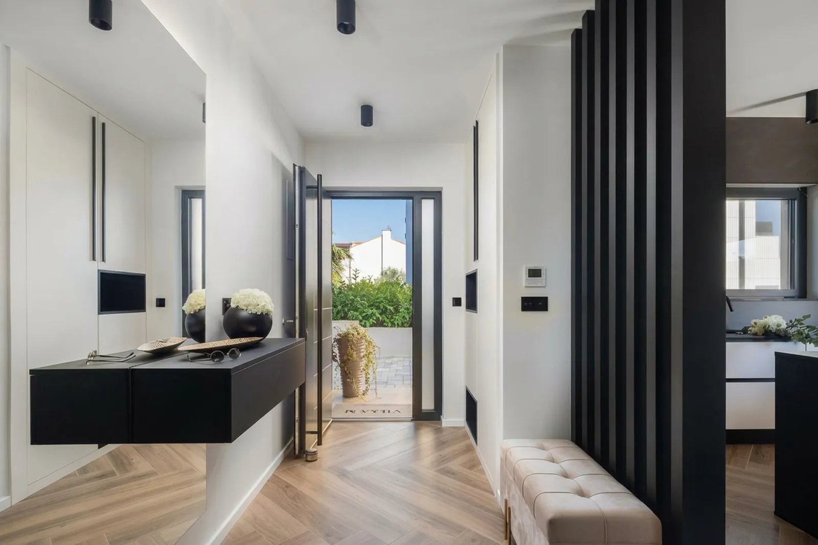 Bright bedroom with garden-facing window and bench