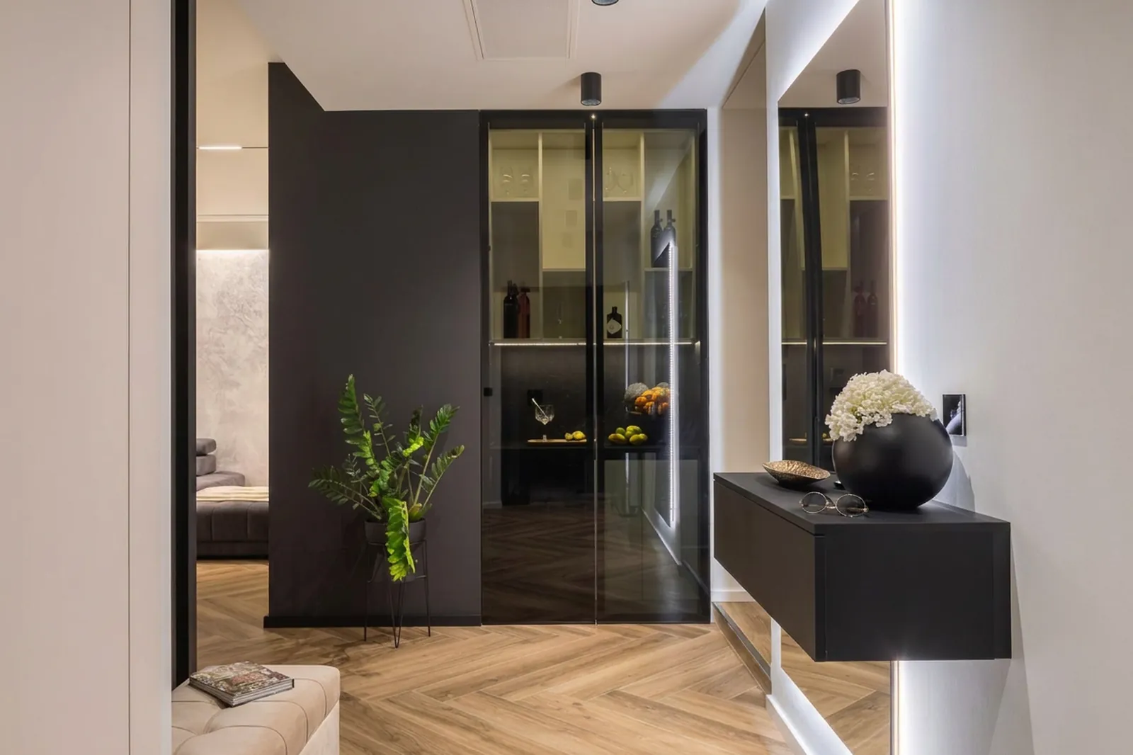 Interior opening onto the planted garden through full-height glazing