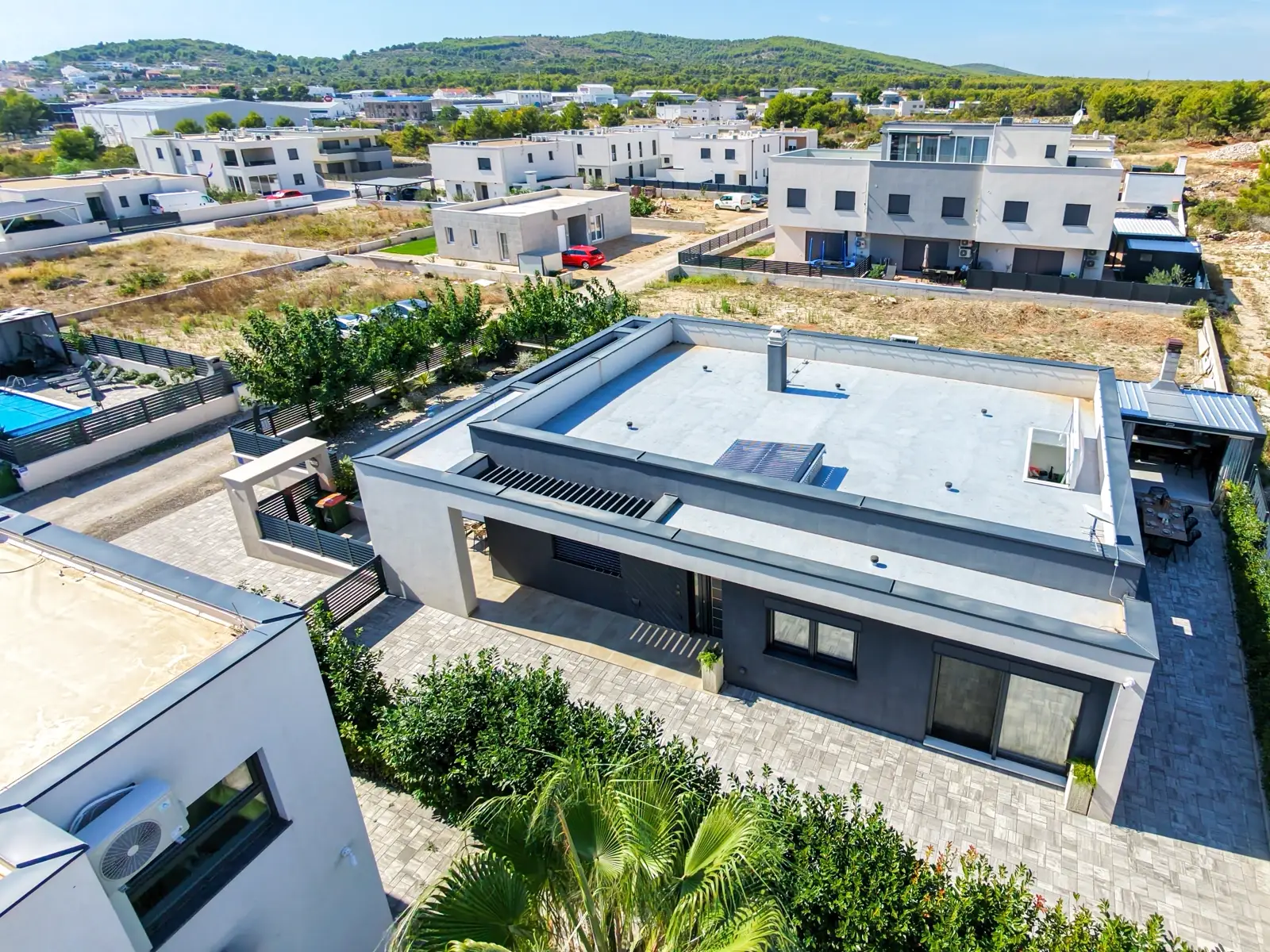 Aerial view of Villa M and the surrounding plot