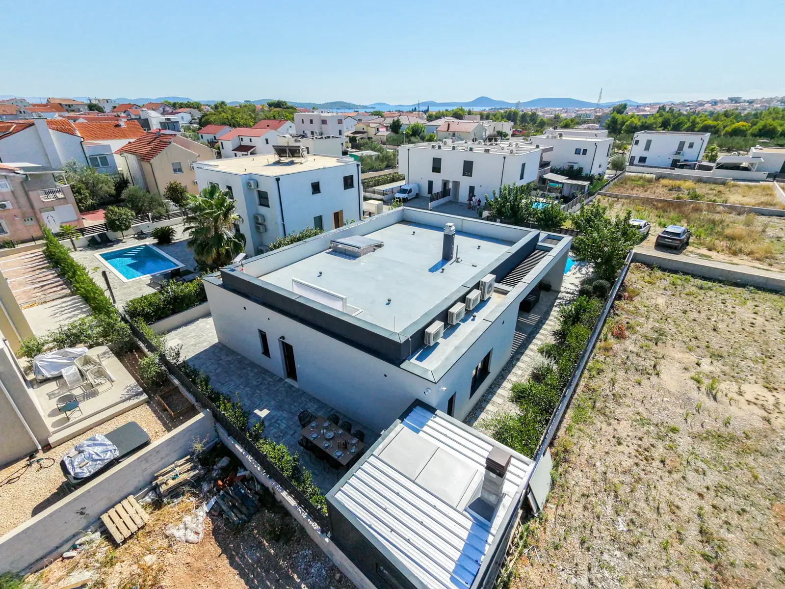 Aerial view over Villa M toward the garden
